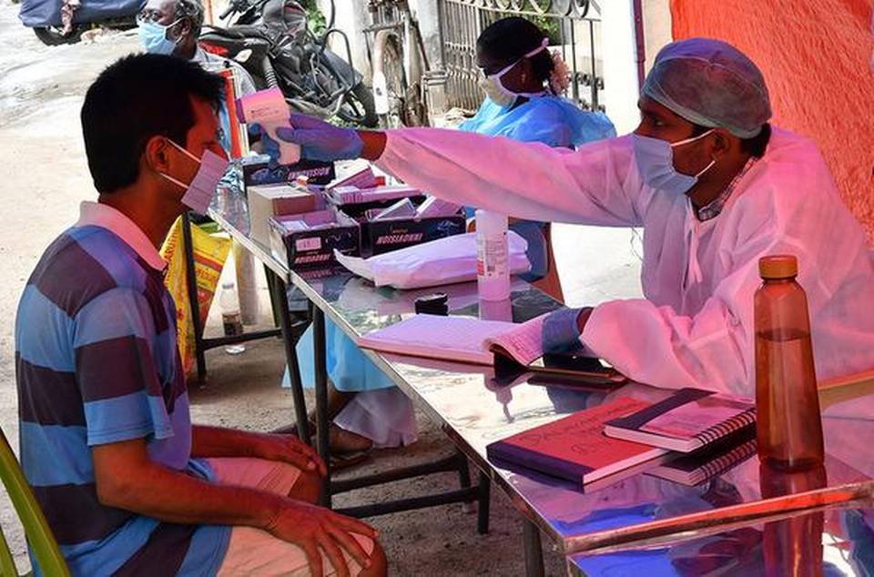 A resident being screened at a special medical camp in Alandur, Chennai. 