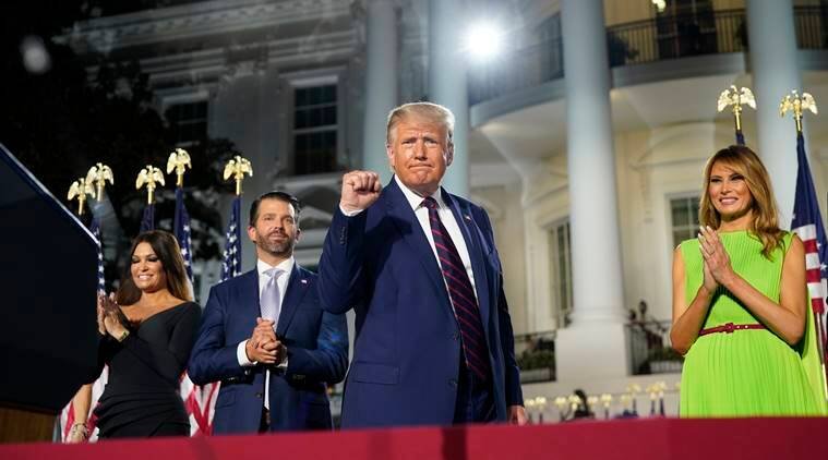 President Donald Trump is joined on stage by family members during the final night of the Republican National Convention, on the South Lawn of the White House in Washington, on Thursday, Aug. 27, 2020. From left: Kimberly Guilfoyle, Donald Trump Jr., President Trump and first lady Melania Trump.