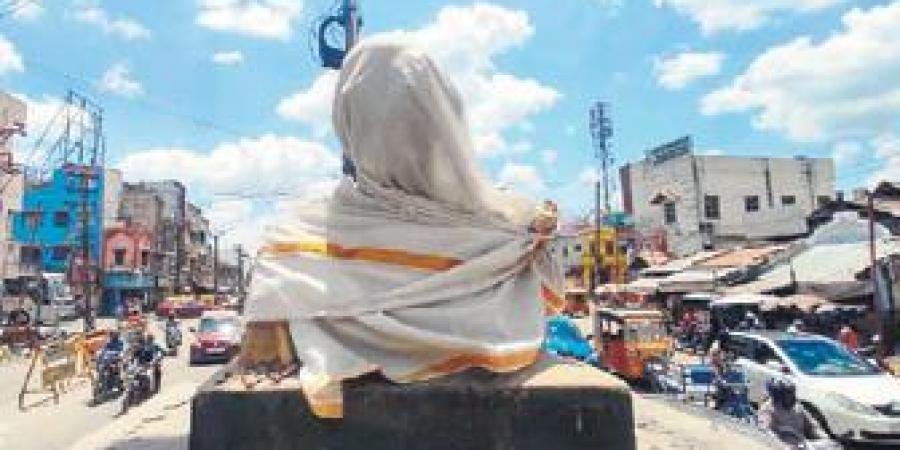The Gandhi bust that was covered by election officials in Madurai