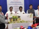 G. Natarajan, second from right, Postmaster General, Southern Region, Madurai, releases the special postal cover on GI-tagged ‘Madurai Malli’ in Madurai on Wednesday.