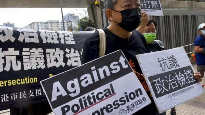 Hong Kong activists plead guilty to joining democracy rally