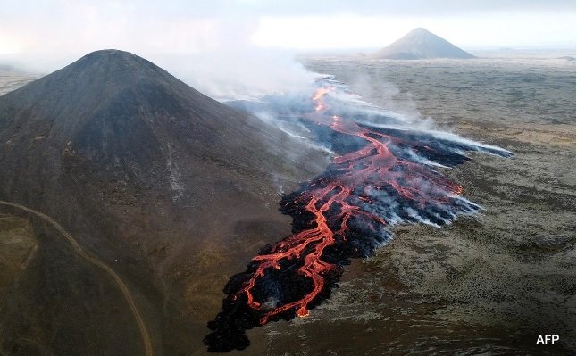 “Orange Like The Sun”: Tourists Rush To Iceland’s Latest Volcanic Eruption
